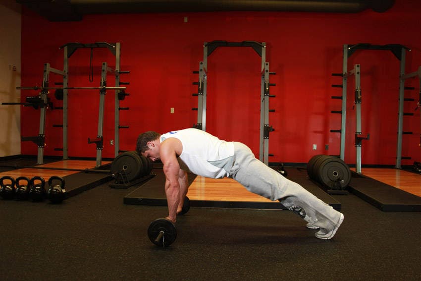 Rueda abdominal con barra, final