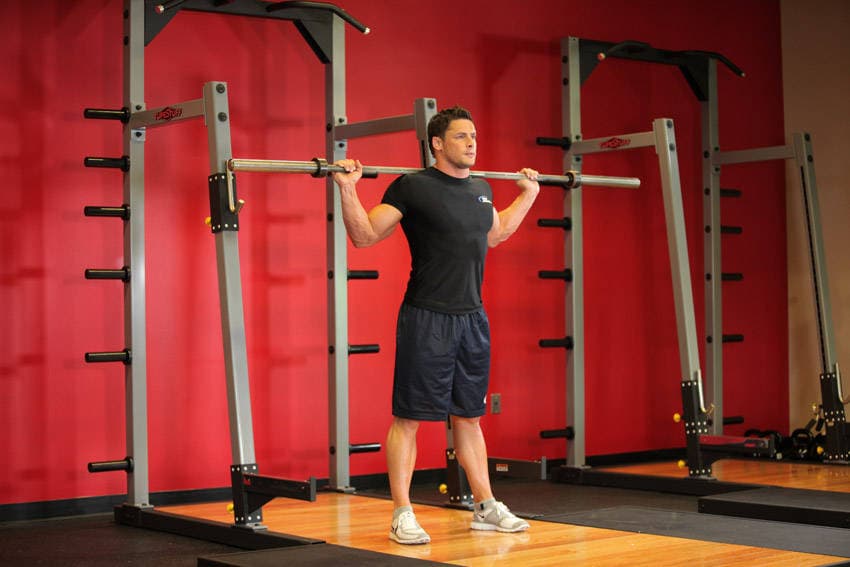 Flexión lateral con barra, inicio