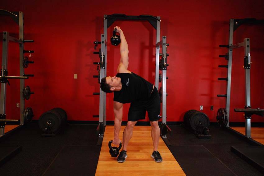 Molino con dos kettlebells, final