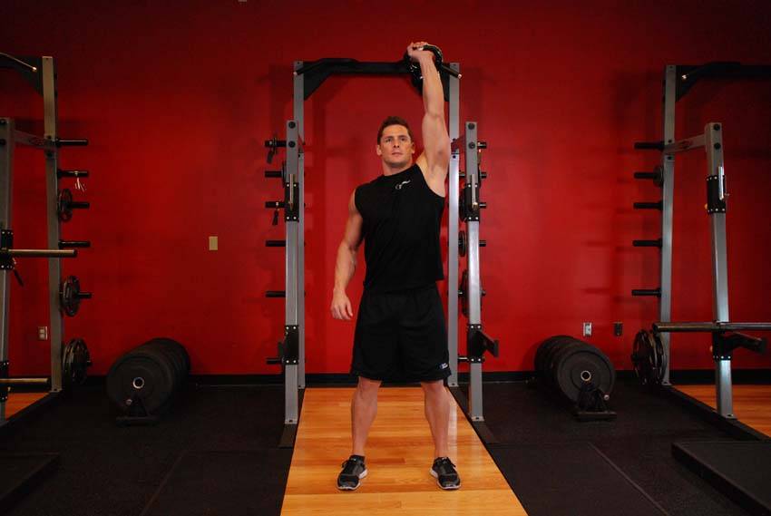 Press Arnold con kettlebell, final
