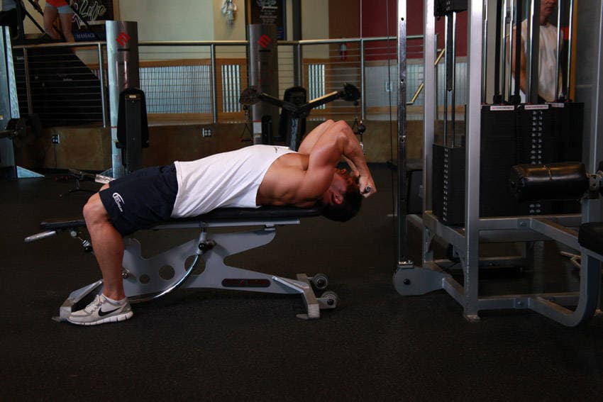 Lying Close-Grip Bar Curl On High Pulley, end