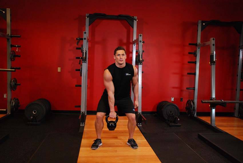One-Arm Kettlebell Clean and Jerk, start