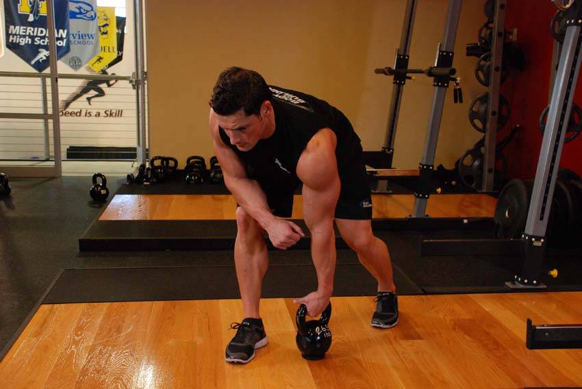 Remo a un brazo con kettlebell, inicio