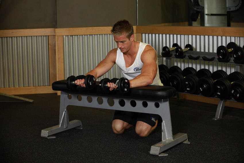 Palms-Down Dumbbell Wrist Curl Over A Bench, end
