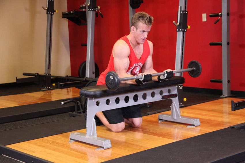 Palms-Up Barbell Wrist Curl Over A Bench, end