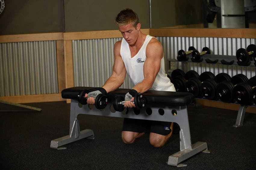 Palms-Up Dumbbell Wrist Curl Over A Bench, start