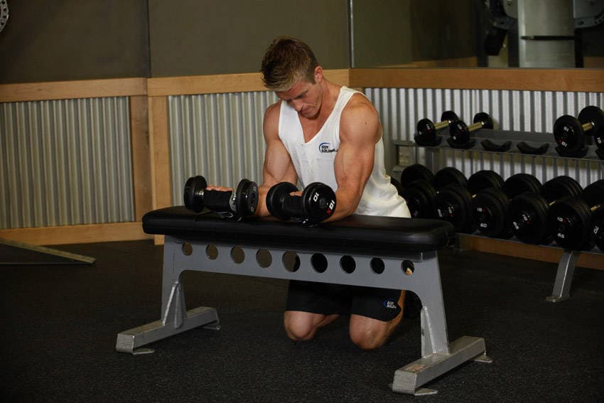 Palms-Up Dumbbell Wrist Curl Over A Bench, end