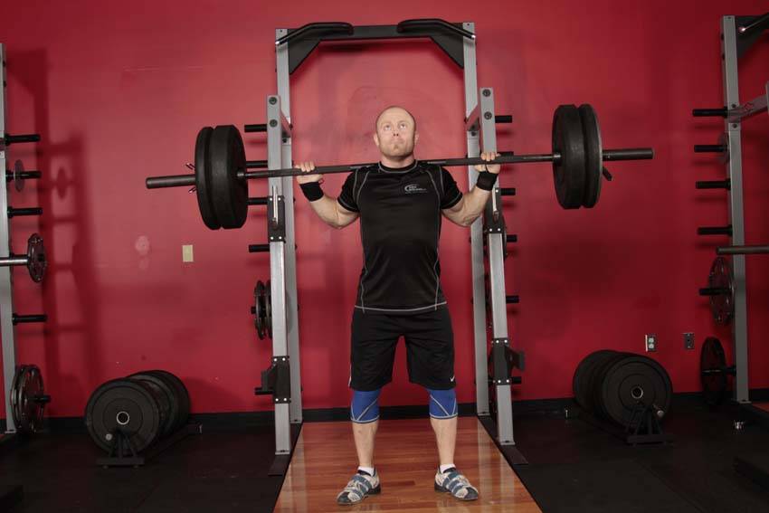 Push press tras nuca, inicio