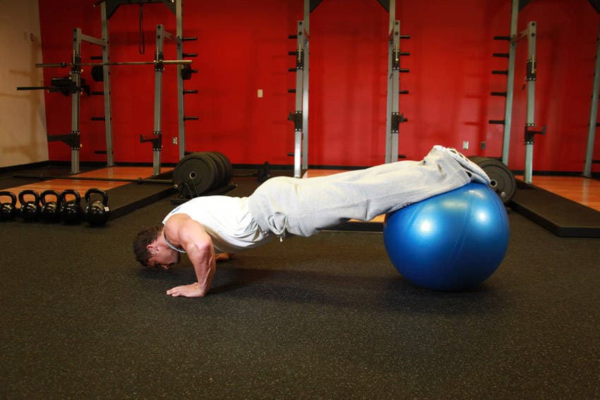 Push-Ups With Feet On An Exercise Ball, start