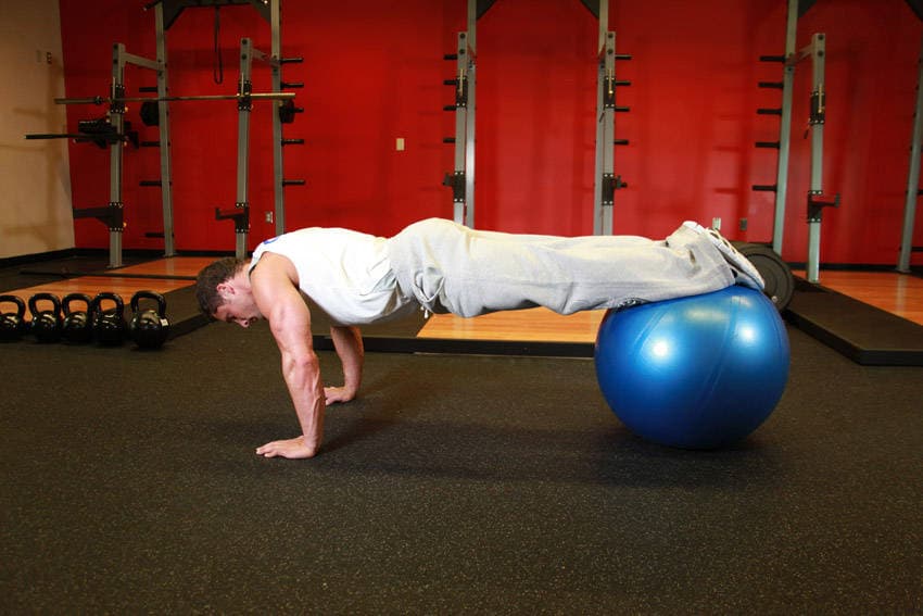 Push-Ups With Feet On An Exercise Ball, end