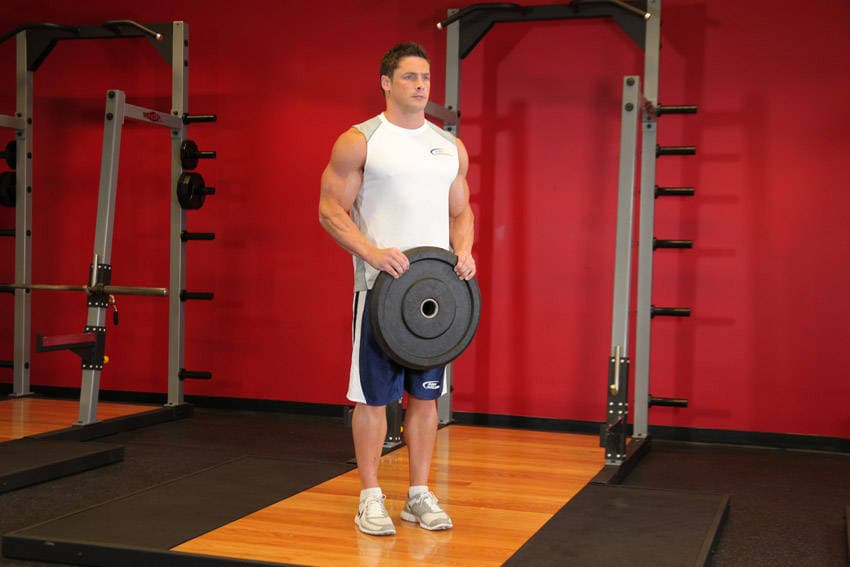 Curl inverso con disco, inicio