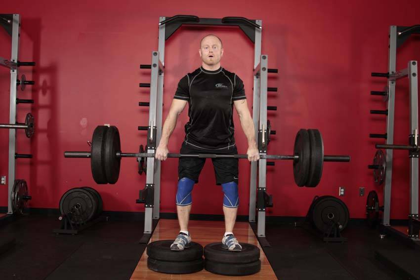 Romanian Deadlift from Deficit, start