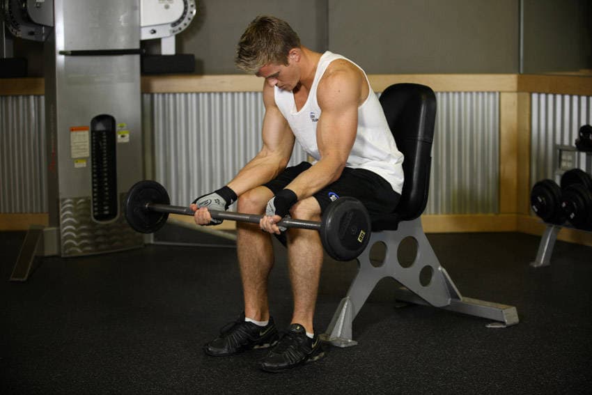 Seated Palm-Up Barbell Wrist Curl, start