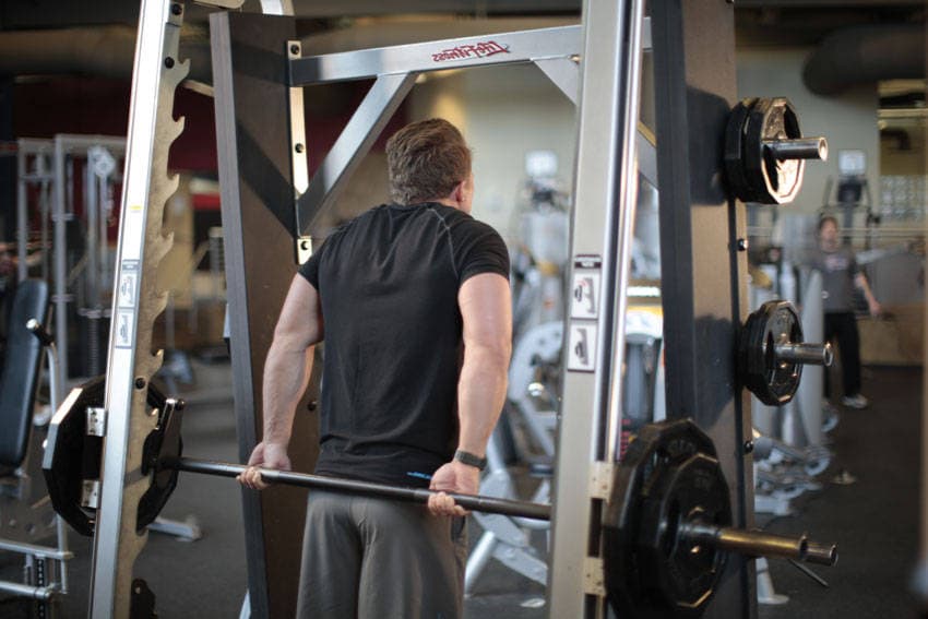 Smith Machine Behind the Back Shrug, end