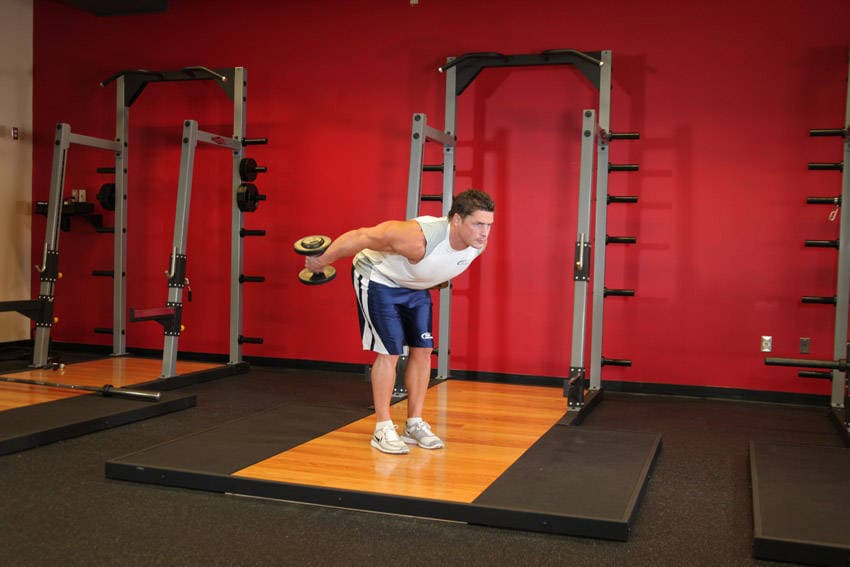 Standing Bent-Over Two-Arm Dumbbell Triceps Extension, end