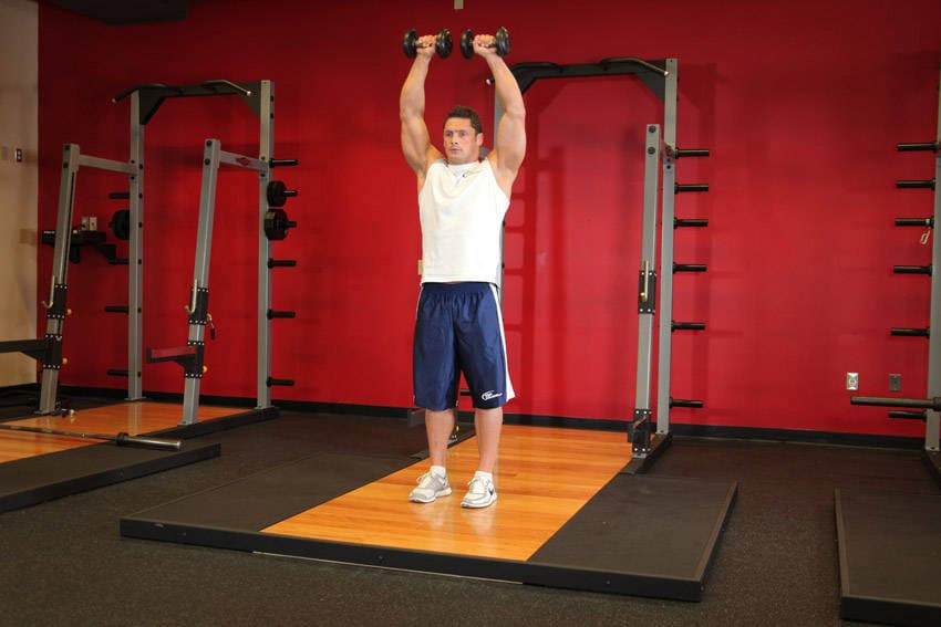 Standing Dumbbell Straight-Arm Front Delt Raise Above Head, end
