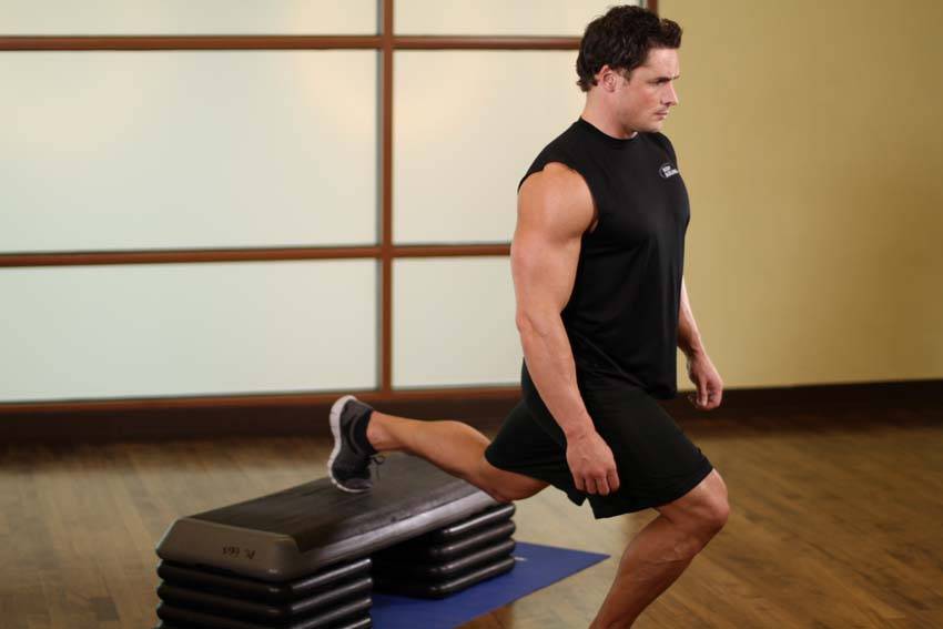 Standing Elevated Quad Stretch, start