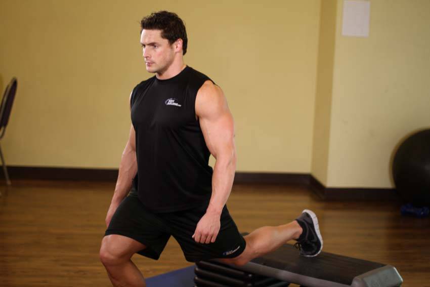 Standing Elevated Quad Stretch, end
